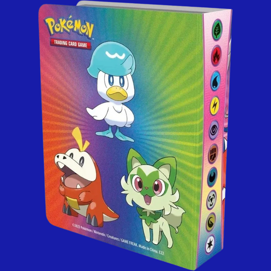 Rear view of the Pokémon Mini Portfolio (Spring 2023) featuring Sprigatito, Fuecoco, and Quaxly on a rainbow background with energy type symbols along the spine.